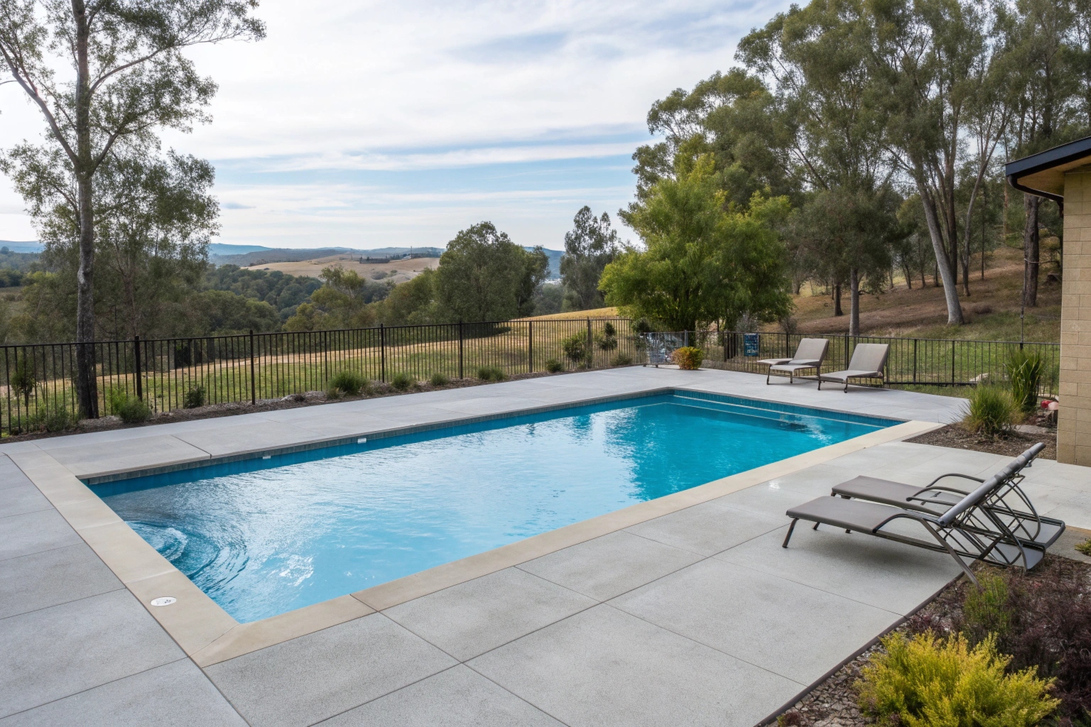 Sealed concrete pool surround Canberra home