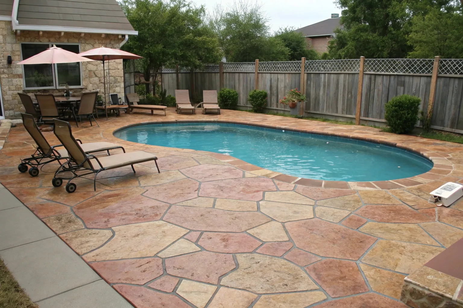 Stamped concrete pool surround flagstone pattern Canberra